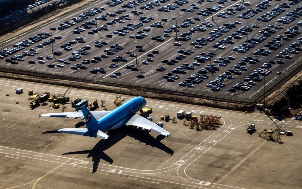 airfield, plane, cars-4899765.jpg